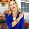 woman wearing halloween charm bracelet