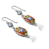 thanksgiving earrings laid on white background
