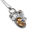 closeup of Beauty and the Beast jewelry